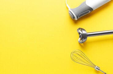 Electric blender on a yellow background. Top view. Space for text.