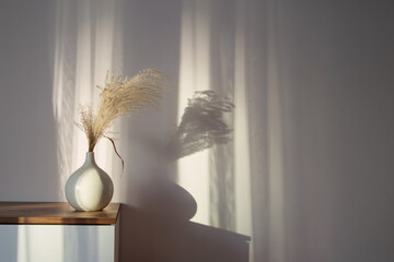 dry cereal ornamental plants in vase on background white wall