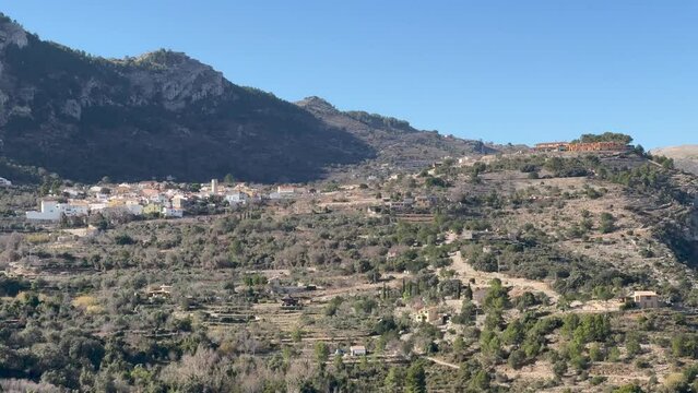Panoramic view of the Hell's Ravine, or El Barranc de l'Infern, in La Vall de Laguar. One of the hardest hiking routes in Spain. The Cavall Verd mountain and the town Benimaurell are in the background