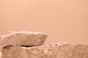 Stone Podium for promotion on beige Background. Natural pedestal. Two stone podiums. Beauty product mockup. Scene to show products. Showcase, display case. Front View, soft shadow