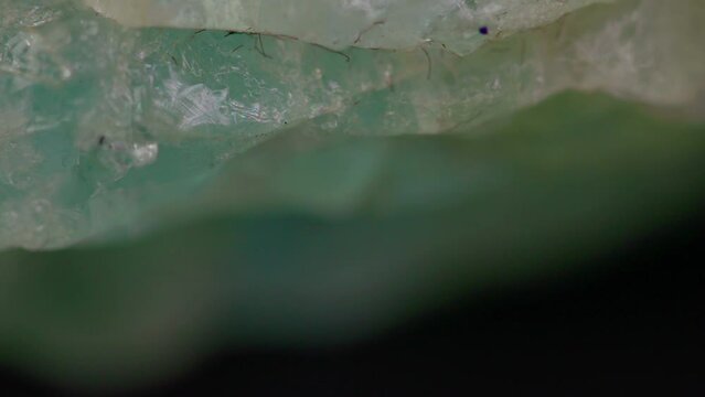 Natural crystal amazonite stone texture rotating abstract background