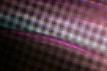 Blurred Light painting one exposure in camera with textured glass. Spectral gradient on a dark...
