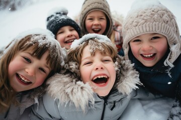 Fototapeta premium The image captures a cheerful group of young children standing closely together and posing for the photo in a snowy environment, Group of children playing on snow in winter time, AI Generated