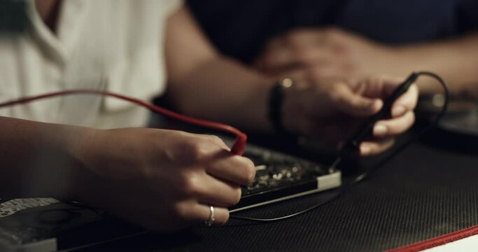 Motherboard, tools and hands of person repair computer hardware, electronics or maintenance of semiconductor. Closeup, tech and expert problem solving, troubleshooting or fixing microchip at night
