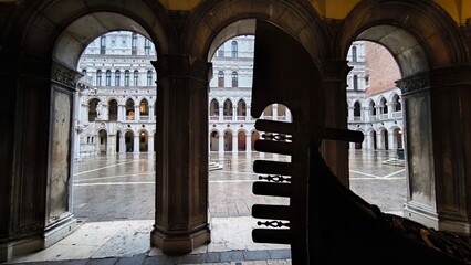 Ferro bow of gondola with Venice background