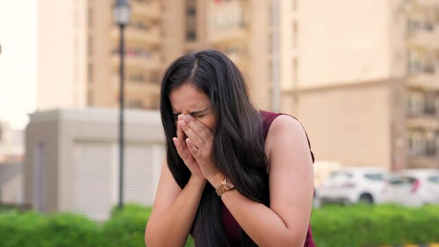 Indian Woman Sneezing