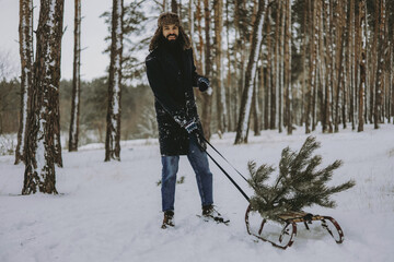 bearded man and xmas tree sliding