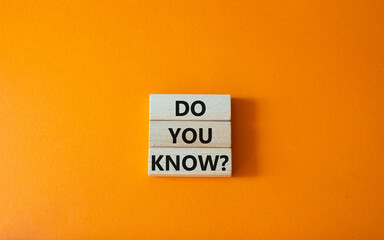 Do you know symbol. Concept word Do you know on wooden cubes. Beautiful orange background. Business...