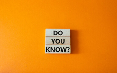 Do you know symbol. Concept word Do you know on wooden cubes. Beautiful orange background. Business and Do you know concept. Copy space.