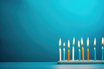 A captivating image of a group of lit candles creating a warm and inviting atmosphere on a table, Happy birthday candles are arranged on a blue background with copy space for text, AI Generated