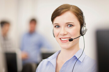 Colleagues working in a call center with a very friendly atmosphere. Munich, Germany
