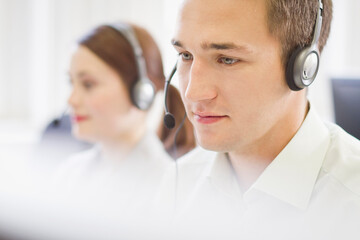 Colleagues working in a call center with a very friendly atmosphere. Munich, Germany