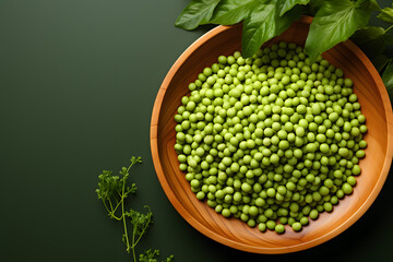 Obraz na płótnie Canvas a bowl of peas and leaves