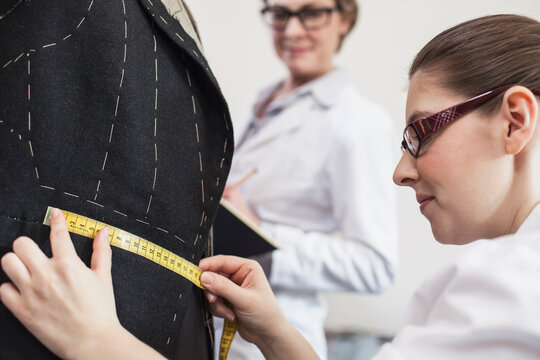 Fashion designers working on new collection of haute couture. Munich, Bavaria, Germany