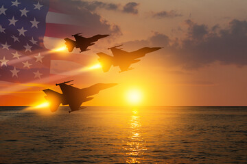 Air Force Day. Aircraft silhouettes on background of sunset on the sea with a transparent American...