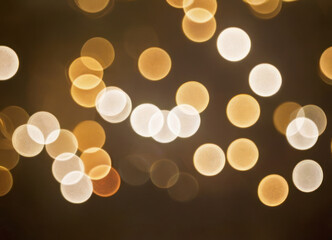 Luxury Blurred abstract background with golden bokeh.