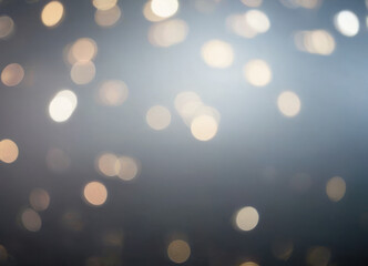 Luxury Blurred abstract background with gold and silver bokeh.