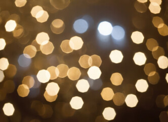 Luxury Blurred abstract background with gold and silver bokeh.