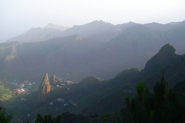 Mountain panorama with famous Roques de San Pedro (Twin rocks of Hermigua), iconic rock formation located in La Hermigua in La Gomera, Canary Islands, Spain