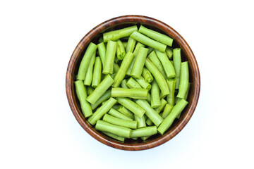 Asparagus beans or Yardlong beans sliced in a wooden bowl top view 