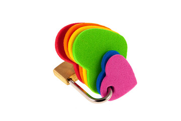 Hearts with the colors of the lgbti flag united with a padlock as a concept.