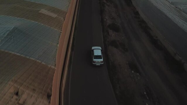Follow Car Narrow Roads in the North of Gran Canaria to the Sunset, routes and crossings of the Canary Islands to drone in 4k