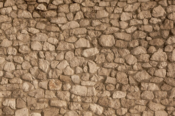Background of stone wall texture photo. Close-up of stone wall.