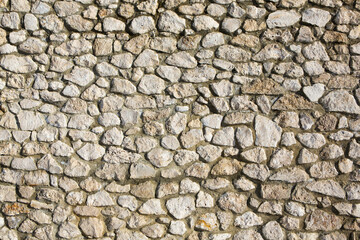 Background of stone wall texture photo. Close-up of stone wall.