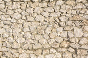 Background of stone wall texture photo. Close-up of stone wall.