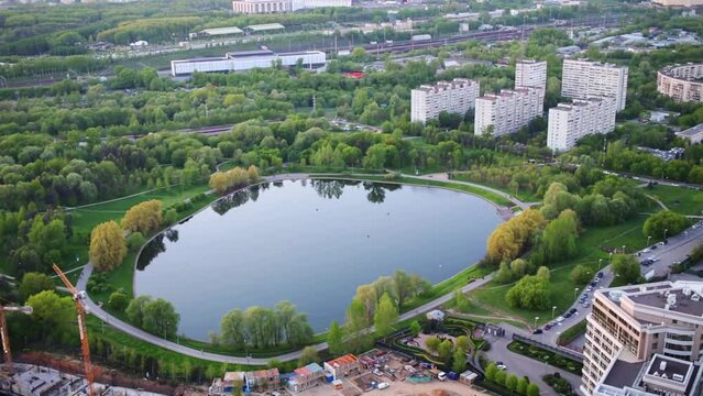 Moscow city business complex with skyscrapers, pond, river