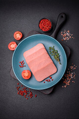 Delicious canned pink ham with salt, spices and herbs