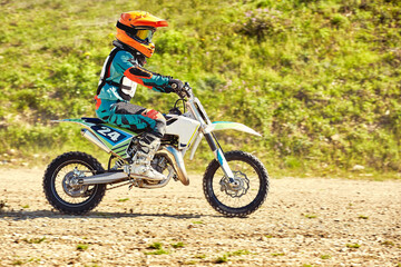 Extreme concept, challenge yourself. Extreme jump on a motorcycle on a background of blue sky with clouds. Copy space, all or nothing.