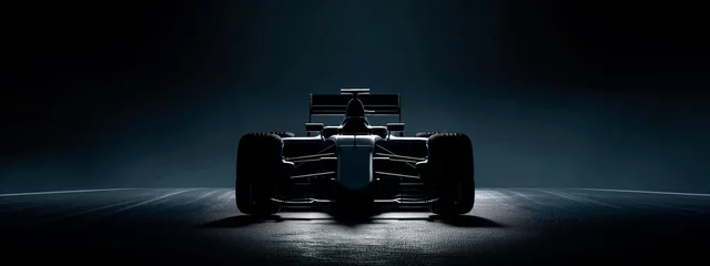 Poster Im Rahmen Silhouette of a Formula One car under dramatic lighting.  © henjon