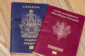 Closeup view of french and canadian passport.