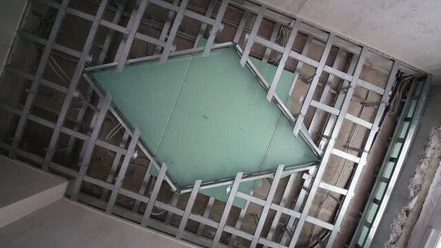 ceiling made of gypsum plasterboard in room under repair.
