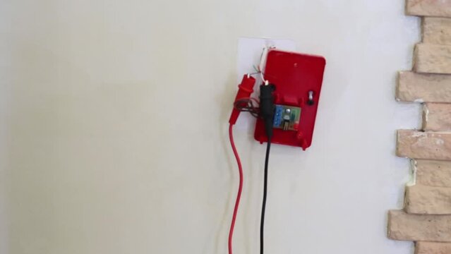 Tone generator connected with wires to line input in the wall.