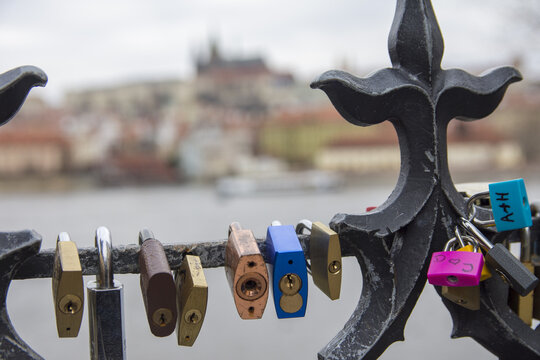 Love locks hanging on a bridge in Prague, Czech Republic