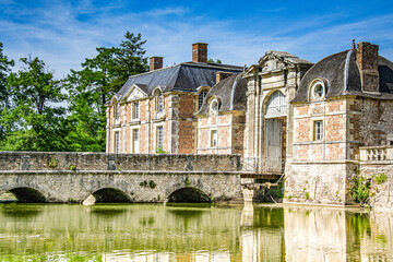 La Ferte Saint Aubin, France,Historical castle buildings with old gate and typical french...