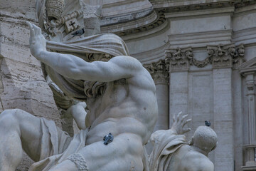 Fountain of the Four Rivers in Piazza Navon in Rome, Italy: detail of the statue representing the Nile River. 