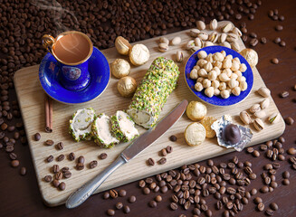 Sweets on the background of coffee on the table
