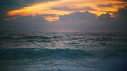 Waves rolling early morning seashore. Breathtaking seascape horizon at cloudy