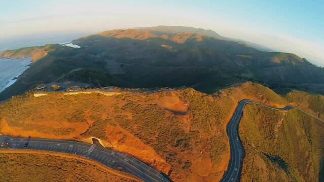 Mountain road near San Francisco Bay at autumn evening.