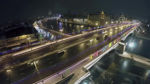 Road traffic on Big Moskvoretsky bridge with illumination
