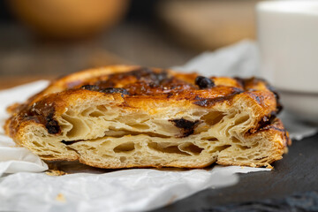 sweet delicious puff pastry with chocolate pieces in caramel