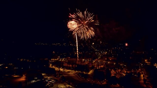 Fireworks in the city to welcome the New Year. Flying through the small town of Valmiera.