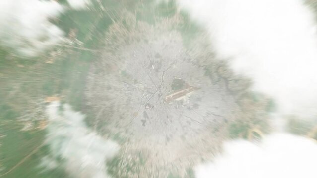 Earth zoom in from space to Ho Chi Minh City, Vietnam. Followed by zoom out through clouds and atmosphere into space. Satellite view. Travel intro. Images from NASA