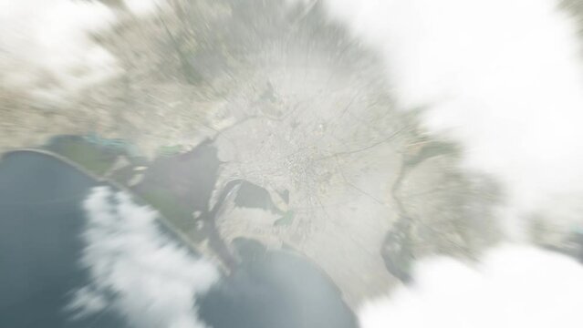 Earth zoom in from space to Karachi, Pakistan. Followed by zoom out through clouds and atmosphere into space. Satellite view. Travel intro. Images from NASA