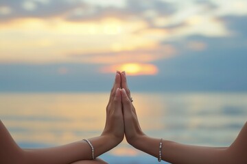 Fototapeta na wymiar Serene Sunset Yoga, Hands in Namaste Over Ocean, yoga, namaste, meditation, sunset, peace, ocean, wellness, spirituality, tranquility, harmony