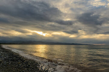 view of the sea and mountains at sunset in Cyprus 3