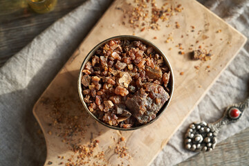 A metal bowl full of myrrh resin